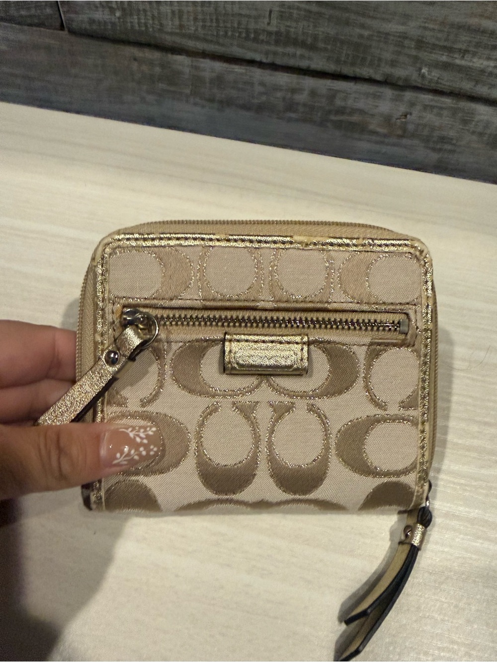 Coach beige and Metallica zip around wallet
